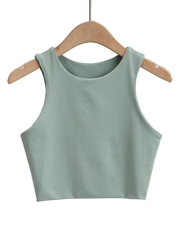 Mint green women's cropped seamless sports top on wooden hanger, perfect for workouts and yoga; breathable, spandex fabric for comfort.